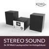A stereo system with two speakers and a central unit, presented on a white background with marketing text at the bottom. Anteprima dell’immagine prodotto