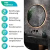 A round LED mirror is mounted on a marble-patterned wall above a black vanity with a sink and faucet. Produktbild-Vorschau