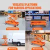 A collage of four images showing a hydraulic lift table in different settings: a supermarket, a factory, a workshop with a van, and a warehouse. Anteprima dell’immagine prodotto