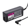 A black laptop power adapter with its charging cable. Produktbild-Vorschau