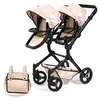 A twin doll stroller and a matching bag are displayed against a white background. Produktbild-Vorschau