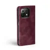 A burgundy flip cover phone case for a Xiaomi Mi 11 Lite 4G/5G is shown from the side against a white background. Produktbild-Vorschau