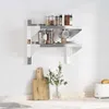 A kitchen shelf with jars and mugs, and cutting boards and a plant on the counter. Anteprima dell’immagine prodotto