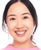 A close-up headshot of a young Asian woman smiling. Produktbild-Vorschau