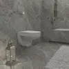A modern bathroom with a wall-mounted toilet, marble-effect tiles, and a decorative lantern. Produktbild-Vorschau