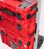 A close-up view of stacked red toolboxes with black latches and handles, attached to a silver cart with a wheel visible. Anteprima dell’immagine prodotto