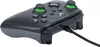 A close-up, angled view of an Xbox controller with a cable plugged in. Produktbild-Vorschau