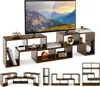 A TV stand with multiple shelves and compartments, displaying various decorative items and books. A television is placed on top. Produktbild-Vorschau
