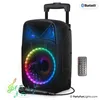 A black portable karaoke speaker with colorful LED lights, a microphone, and a remote control, set against a white background. Produktbild-Vorschau