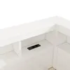 A close-up view of a white wooden shelf with a black electrical outlet featuring two sockets. Voir les images du produit