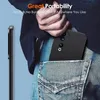 A person is putting a black phone case into their jeans pocket. Produktbild-Vorschau