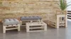 An outdoor lounge set made from wooden pallets, including a bench, an ottoman, and a chair, placed on a concrete floor against a wooden wall. Produktbild-Vorschau