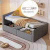 A grey upholstered bed with storage drawers, featuring LED lighting and a pull-out mattress. Produktbild-Vorschau