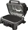 An open electric grill with its lid raised, showing the grilling surface and internal fan. Voir les images du produit