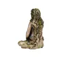 A figurine of a woman with her back to the viewer, seated in a lotus position. Her hair and body are adorned with leaves and vines, giving her a natural, earthy appearance. Produktbild-Vorschau