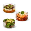 Three glass bowls filled with different types of food, arranged on a white background. Anteprima dell’immagine prodotto