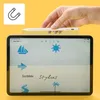 A hand holding a stylus above a tablet displaying a drawing app. Voir les images du produit
