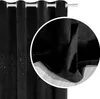 A close-up view of a black velvet curtain with sparkling crystal embellishments. Podgląd zdjęcia produktu