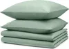 A stack of folded bedding and pillows. Produktbild-Vorschau