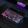 A gaming keyboard with neon graffiti design and RGB lighting is placed on a black mousepad with a subtle grid pattern. Anteprima dell’immagine prodotto