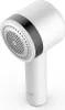A white lint remover with a black band around the head, shown against a white background. Produktbild-Vorschau