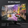 A curved monitor displaying a split image comparing 1080p and 8K resolutions, with inset close-ups and feature callouts. Produktbild-Vorschau