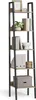 A tall, narrow ladder shelf unit filled with decorative items and books. Produktbild-Vorschau