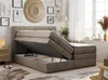 A bedroom scene featuring a boxspring bed with its storage compartment open. Produktbild-Vorschau