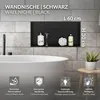 A black wall niche with bathroom accessories is shown above a white bathtub, with informational icons at the bottom. Náhled obrázku produktu