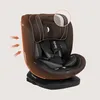 A brown and black car seat with orange accents and arrows indicating airflow. Produktbild-Vorschau