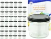 A set of small glass jars with black lids, arranged in rows, next to a product box and a single jar. Náhled obrázku produktu