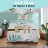 A child's bedding set with a sloth design is displayed in a bedroom setting. Produktbild-Vorschau