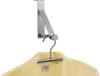 A stainless steel over-the-door hook holding a hanger with a yellow garment. Produktbild-Vorschau