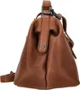 A close-up side view of a brown leather handbag. Podgląd zdjęcia produktu