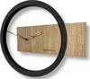 A modern wall clock with a black circular frame and a wooden rectangular face. Anteprima dell’immagine prodotto