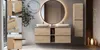 A modern bathroom vanity with a double sink, illuminated mirror, and storage cabinets, styled with plants and decorative items. Podgląd zdjęcia produktu