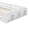 A close-up, angled view of the headboard and side of a white wooden bed frame with built-in shelving. Produktbild-Vorschau