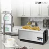 A stainless steel Clatronic toaster with four slices of toast is placed on a kitchen counter, next to a sink and a cup of coffee. The kitchen has white cabinets and a grey tiled backsplash. Produktbild-Vorschau