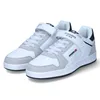 A pair of white and gray Dockers by Gerli sneakers for boys. Produktbild-Vorschau