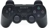 A black Sony Playstation 2 Dual Shock controller is shown against a white background. Produktbild-Vorschau