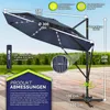 A large navy blue cantilever umbrella with integrated LED lights, shown on a wooden deck with a green lawn and trees in the background. Dimensions and features are highlighted with text and graphics. Voir les images du produit