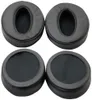 Four black ear pads for headphones are arranged in a two-by-two grid on a white background. Voir les images du produit