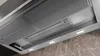 Close-up view of the underside of a modern stainless steel range hood with built-in lights, set against a marble-patterned wall. Náhled obrázku produktu