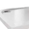 A close-up view of a white shower tray with a silver drain. Anteprima dell’immagine prodotto