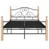 A product shot of a black metal bed frame with wooden posts, shown against a white background. Produktbild-Vorschau