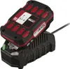 A black and red battery charger with a battery pack on top, shown from a slightly elevated angle. Produktbild-Vorschau