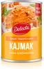 A can of Kajmak (fudge mass) with a slice of cake on top. Náhľad obrázku produktu