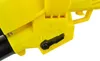 A close-up view of a yellow and black power tool, likely a leaf blower or vacuum, showing a black lever and some molded plastic details. Podgląd zdjęcia produktu