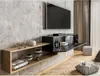 A modern living room with a wall-mounted TV and media console. Náhled obrázku produktu