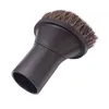 A close-up studio shot of a vacuum cleaner brush attachment. Voir les images du produit